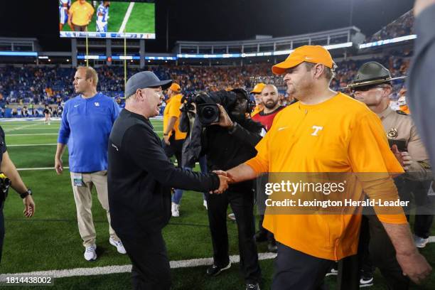 kentucky-coach-mark-stoops-left-shakes-hands-with-tennessee-coach-josh-heupel-after-game-oct.jpg