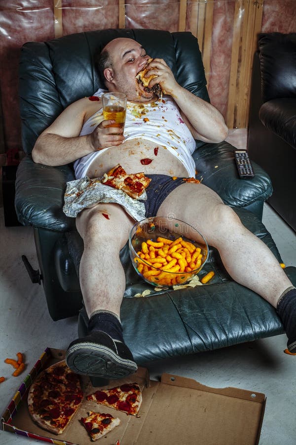 fat-man-eating-and-watching-television-114526021.jpg