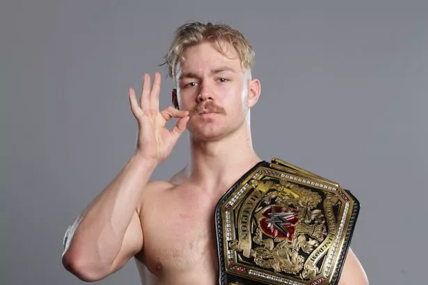 Tyler-Bate-with-Championship-title-4.jpg